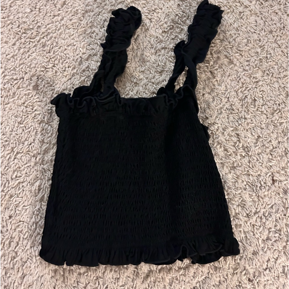 Cute little black top! Size juniors XS!